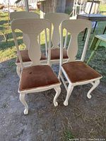 Four antique chairs painted white, solid wood, with padded seats in brown fabric needing upholstery.