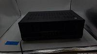Full front and top view of a black Sony STR-DH520 AV receiver showing ventilation and general condition.