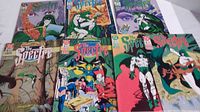 Seven DC Comics The Spectre comic books laid out showing front covers, featuring a variety of action and supernatural themed artwork.
