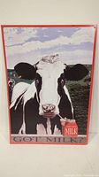 Front view of metal 'Got Milk?' sign showing cow and milk carton imagery.
