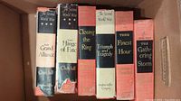 Six-volume Winston Churchill Second World War book set in a box with visible dust jackets showing age wear and tattered edges.