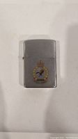 Front view of Zippo lighter showing Goose Bay emblem with bird and text