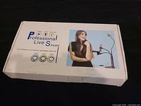Box exterior with product branding and image showing a woman using the kit.