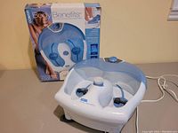 Conair Body Benefits foot spa with box, shows front and overall unit appearance and packaging.