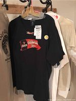 Medium black Astros Official National League Champions World Series t-shirt with championship banner logo on front.