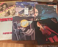Five vintage vinyl albums arranged side by side showing album cover art by Montrose, Moody Blues, Mahogany Rush, Dave Mason, and Emilie McCormick.