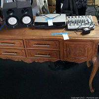 Overall shelf view showing Yamaha speakers, Bose DVD player, and Eurorack mixer on a wooden desk.