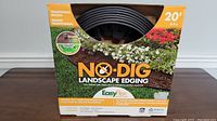 Front view of the 20 feet No Dig Landscape Edging packaging showing brand, type and length.