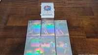 Stacked and spread holographic 1992 McDonald's All-Star basketball cards.