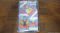 Box of loose or packaged collectible character cards from the movie Anastasia.