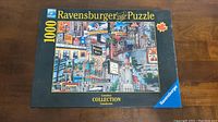 Box front showing full illustration of Toronto landmarks and puzzle piece count