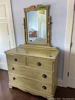 Front view of the whole dresser with mirror, showing overall design, color, and condition.