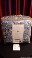Packaged Vintage Chic Collection Vintage Blue Queen Bed in a Bag with label and handle on top