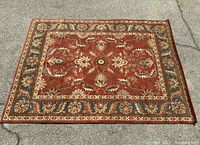 Full view of rectangular Surya Caesar wool rug laid flat showing overall pattern and colors.