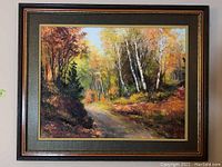 Front view of framed autumn landscape oil painting