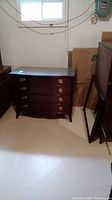 Front view of dresser with glass top