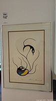 Framed Aboriginal print titled 'Roots Of Life' showing full artwork and signatures with edition number.