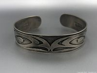 Front view of sterling silver cuff bracelet with eagle design