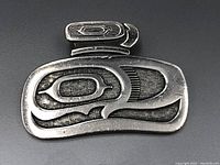 Front view of the First Nations style sterling silver pendant showing engraved and textured design details