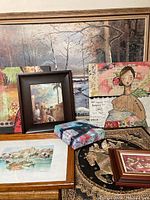 Overview of 8 art pieces including framed paintings, prints, mixed media artwork and a decorative box