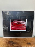 Full view of framed photograph showing the composition and frame style.