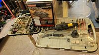 Craftsman shaper/router table with box, Workforce rotary tool, and organized rotary tool accessories in plastic cases