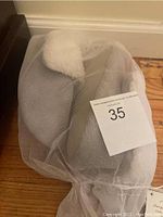Pottery Barn women's small Sherpa faux fur cozy booties wrapped in sheer white protective bag