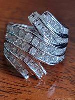 Angled front view showing diamond-set bypass design