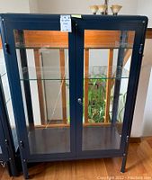 Front view of closed cabinet with lights on