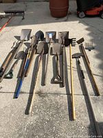 Overview of garden tools including shovels, spades, garden forks, and other small hand tools