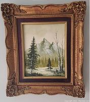 Frontal photo of the framed landscape painting showing the full artwork and frame.