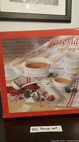 Picture of the original box labeled Fireside 7 piece soup set containing white ceramic bowls with handles.