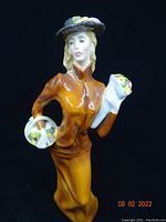 Front view of Royal Doulton Eliza HN2543 porcelain figurine showing detailed paint and finish.