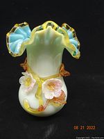 Full front view of cased glass vase showing applied decoration and color gradient