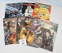 Photo showing 9 comics including Buffy the Vampire Slayer, The Creep, Gunsmith Cats, and five Sigil issues laid out in overlapping arrangement, illustrating the lot contents.