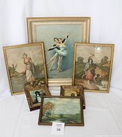 All seven framed prints arranged in group showing size variation and style