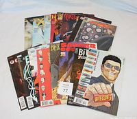 A group of 15 Vertigo comics laid out, showing a variety of cover art including Bite Club 3, Saucer Country #1, and other titles. Comics are in good condition and not graded.