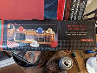 Box showing the 4 piece storage jar set with utility rack, new in box, New Chef brand