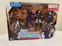 Boxed Marvel Universe The West Coast Avengers figures with Mockingbird, Hawkeye, and War Machine in plastic window box.