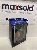 Front view of Mer-Man figure in sealed original Masters of the Universe Masterverse packaging showing figure and branding