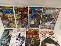 Full lot of 8 comics bagged and boarded arranged in two rows showing all covers clearly.