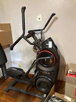 Bowflex Max Trainer M3 elliptical machine full view showing frame, handlebars and pedals.