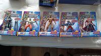 Full set of five Guardians of the Galaxy action figures in original packaging including Drax, Star-Lord, Groot, Rocket Raccoon, and Star-Lord.