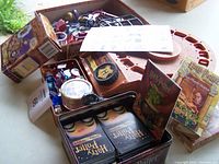 Photo showing the Harry Potter Levitating Challenge game pieces, including keys, tokens, game base, and the boxed Casting Stones Starter Game.