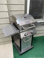 Full front-left view of stainless steel Nexgrill Evolution Infrared Plus propane grill