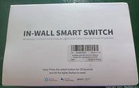 Box with label reading In-Wall Smart Switch, including instructions and compatibility icons.