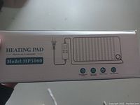 Box side showing model number HP3060 and features including fast heating, adjustable temperature, and overheating protection.