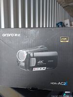 Box of Ordro HDR-AC2 4K UHD camcorder showing picture of the camcorder and branding on front