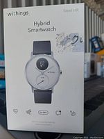 Front view of the Withings Steel HR Hybrid Smartwatch box showing watch image and model info