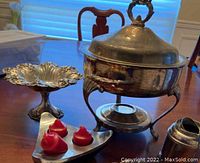 Overall shot showing compote, chafer, candleholder and sugar cube holder